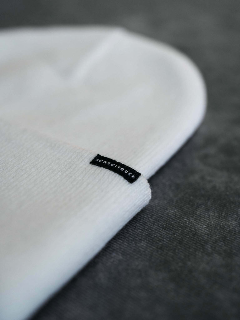 senseitouch woven label on white beanie (7468097437949)