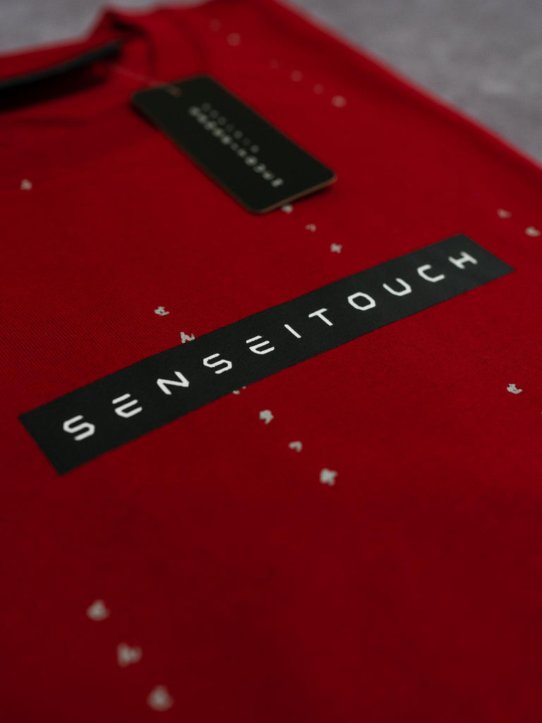 senseitouch patterned red shirt closeup (7468312592637)