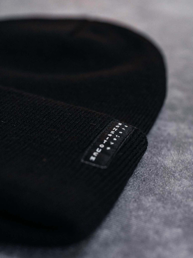 senseitouch logo woven label on black beanie (7468097667325)