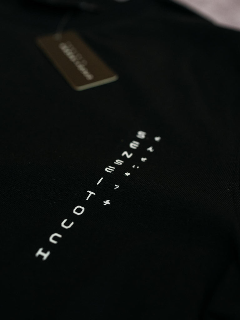 senseitouch logo print on black shirt closeup (7468312658173)